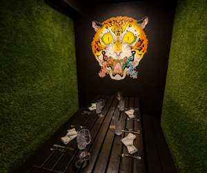 table setting with tiger artwork