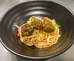 DUCK MEATBALLS OVER UDON NOODLES